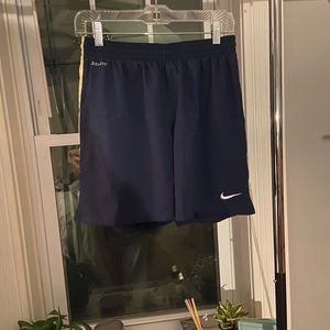 Navy blue swim shorts.